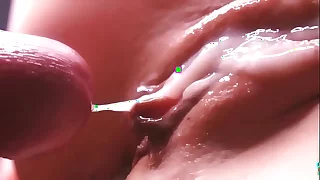 cum between her labia. Close-up